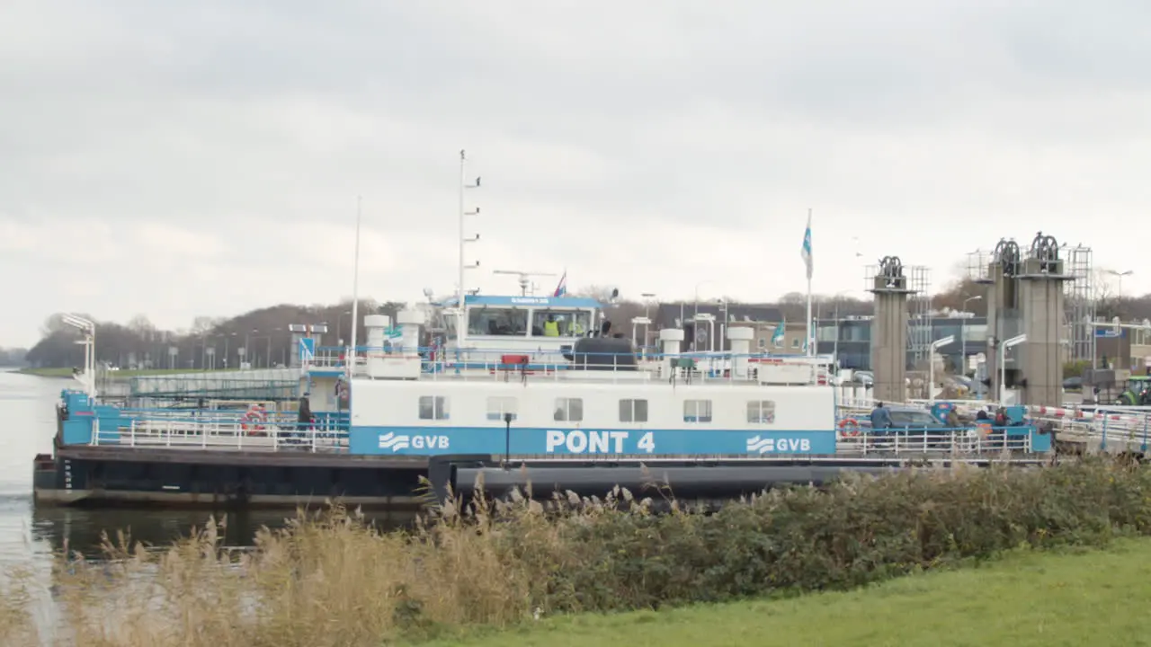 Wide shot of Amsterdam Ferry docking