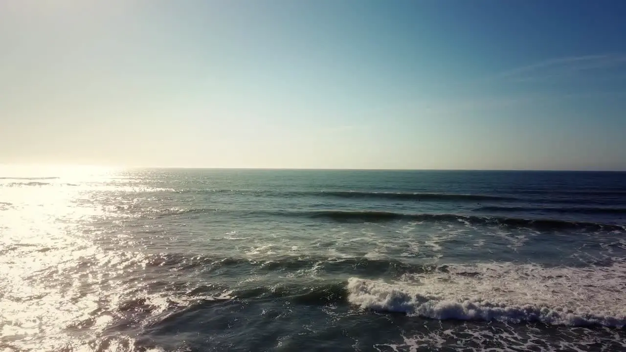 Slow aerial over pacific ocean waves