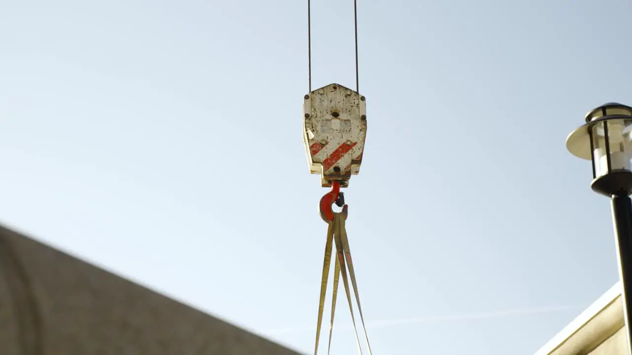 Crane moving a large vehicle