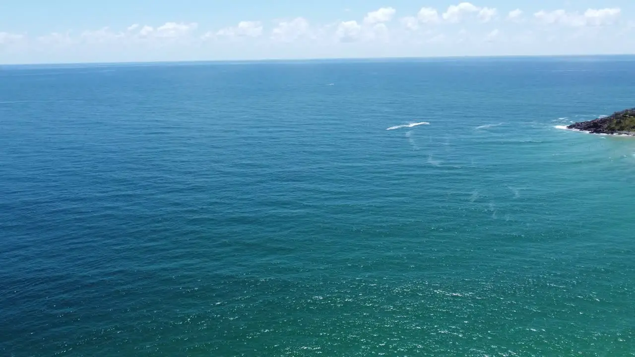 Aerial view of the ocean and part of a peninsula