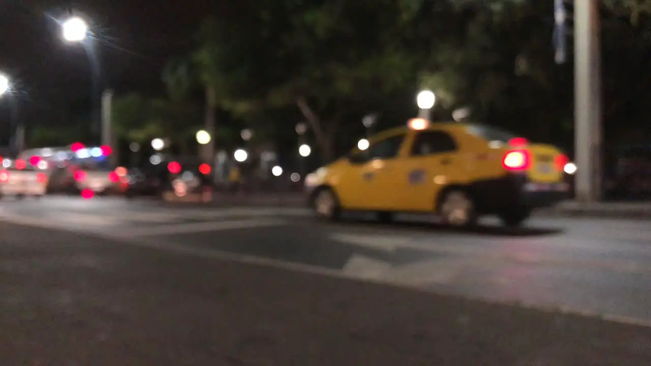 Blurred scene of cars passing by in a low traffic street in Guayaquil Ecuador-2