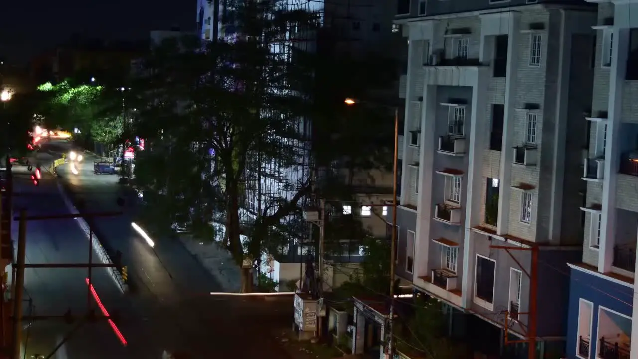 A long exposure timelapse of traffic from the terrace of a building during the night in Hyderabad