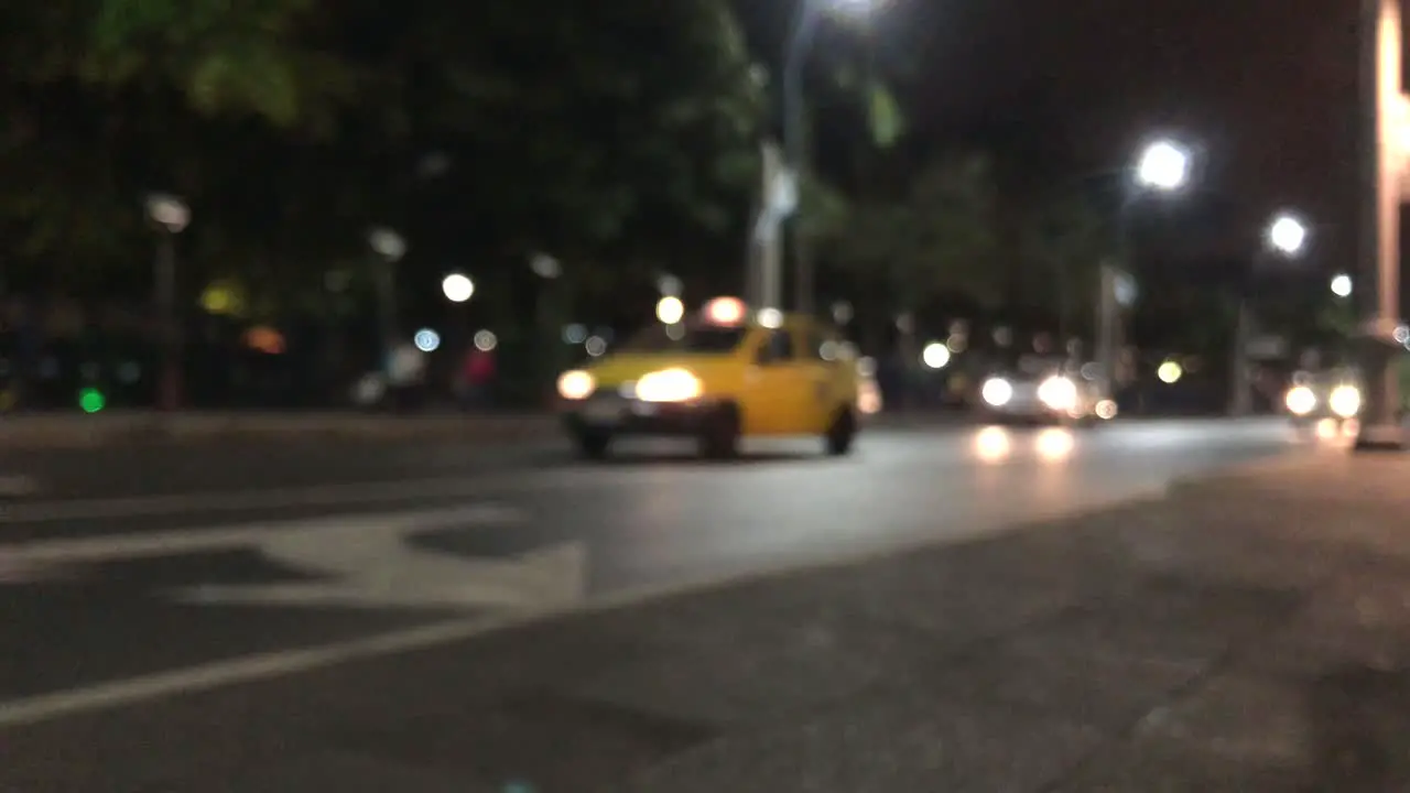 Blurred scene of cars passing by in a low traffic street in Guayaquil Ecuador-3