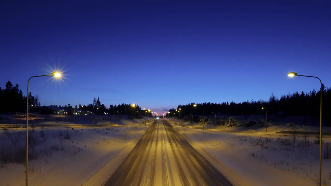 timelapse of cars on snowy winter highway in Vaasa Finland