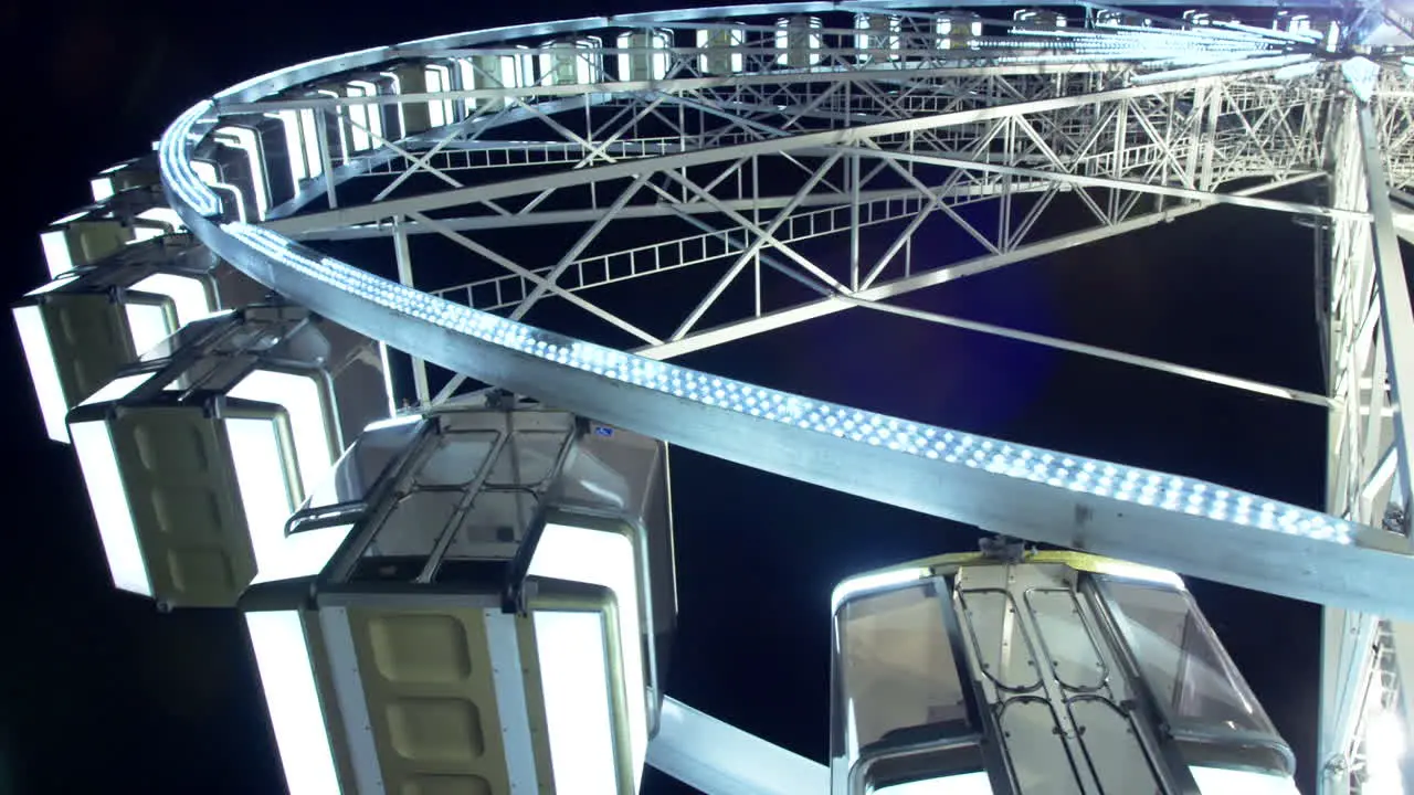 Ferris wheel in amusement park during night time