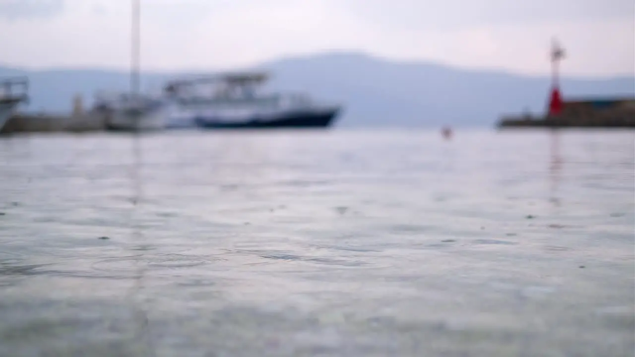 Footage of Rain Drops on the Ocean at a Port Near Split Croatia