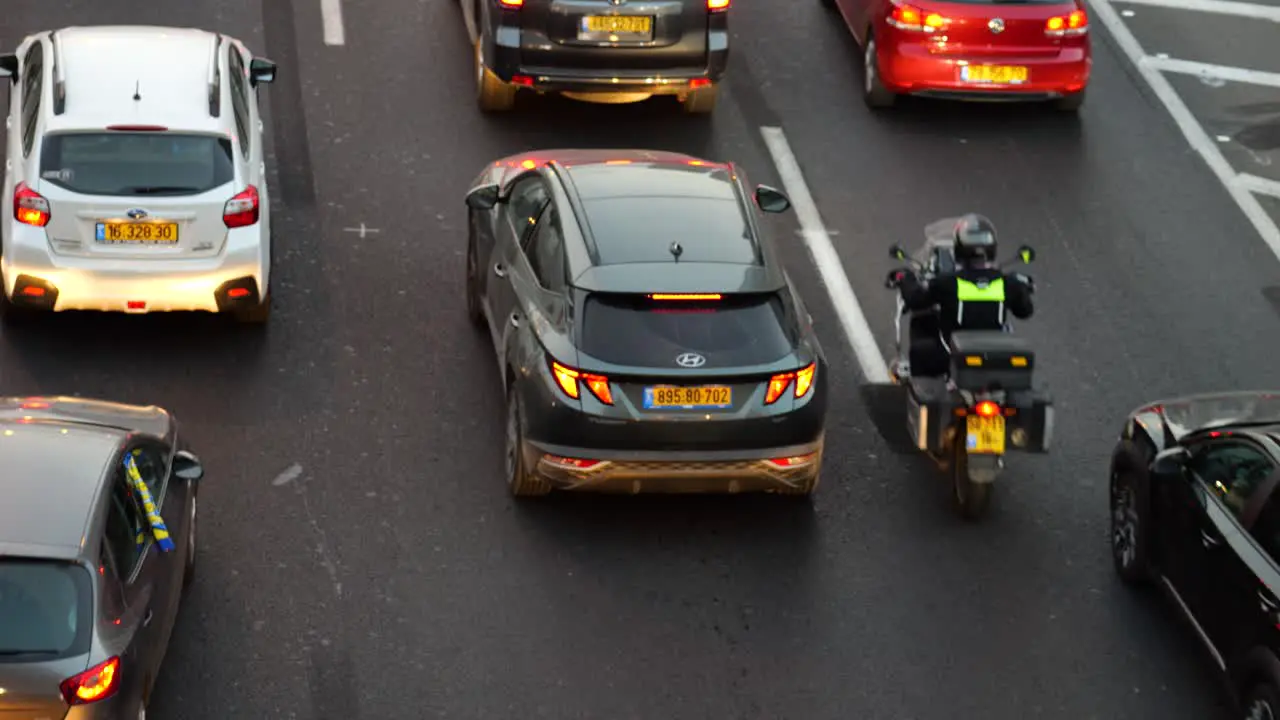 Family cars rushing in during traffic jam at Ayalon highway Tel Aviv