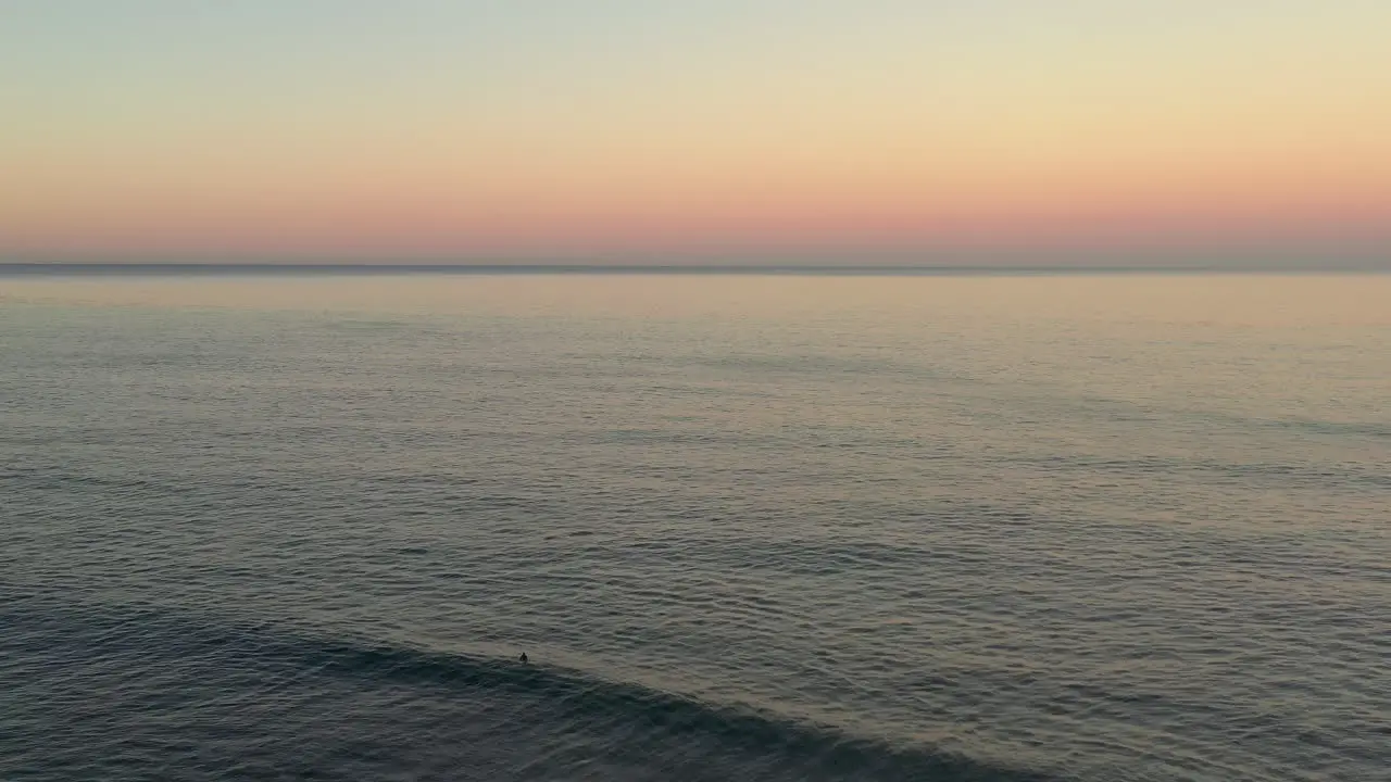 Lone surfer in the water in La Jolla California