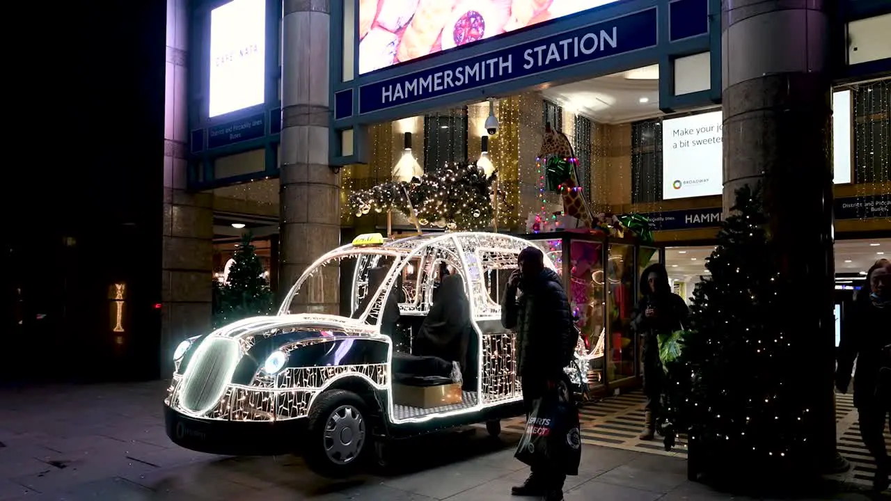 Christmas Taxi Outside of Hammersmith Station London United Kingdom