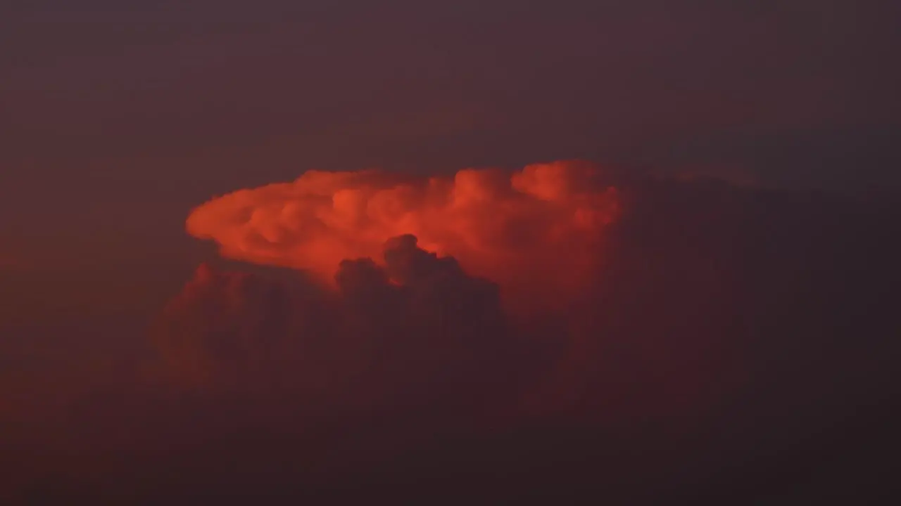 Amazing vibrant cumulonimbus clouds movement in twilight sky at sunset