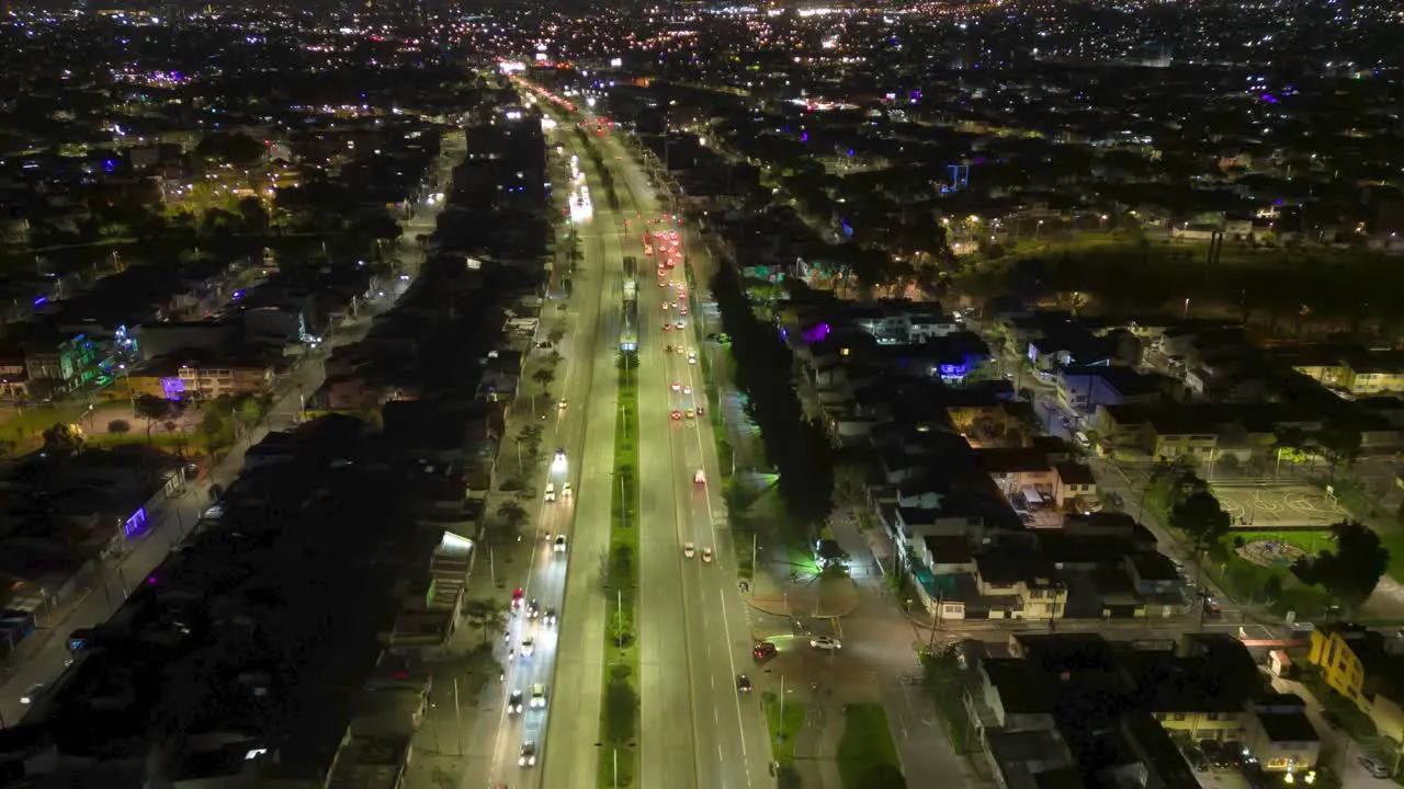 Aerial hyperlapse of the city of Bogota at night Transmilenio transportation