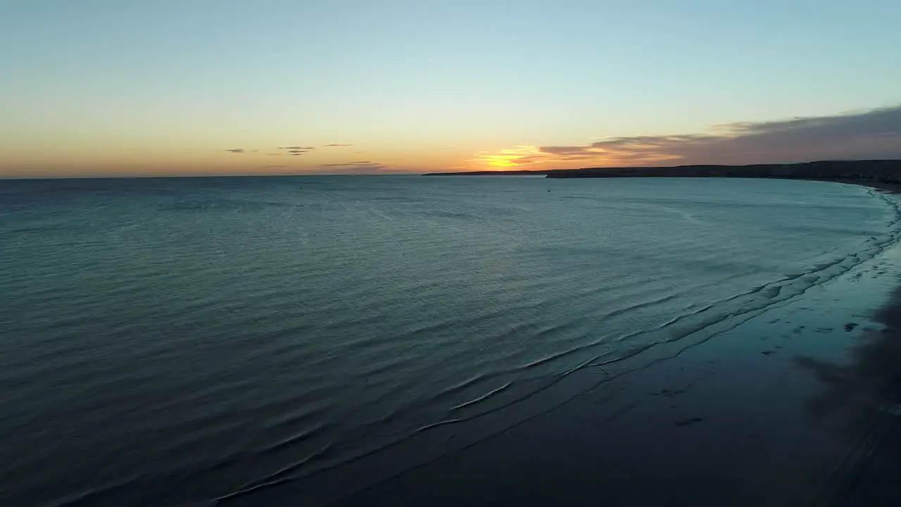 An aerial shot of a Patagonian coast in South Argentina filmed on sunset