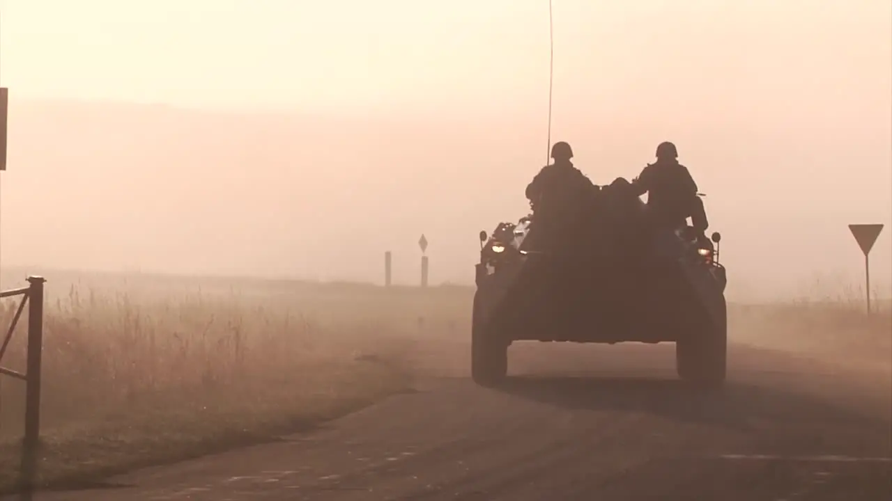 A Large Mobilization Of Tanks And Humvees Move Across The European Countryside