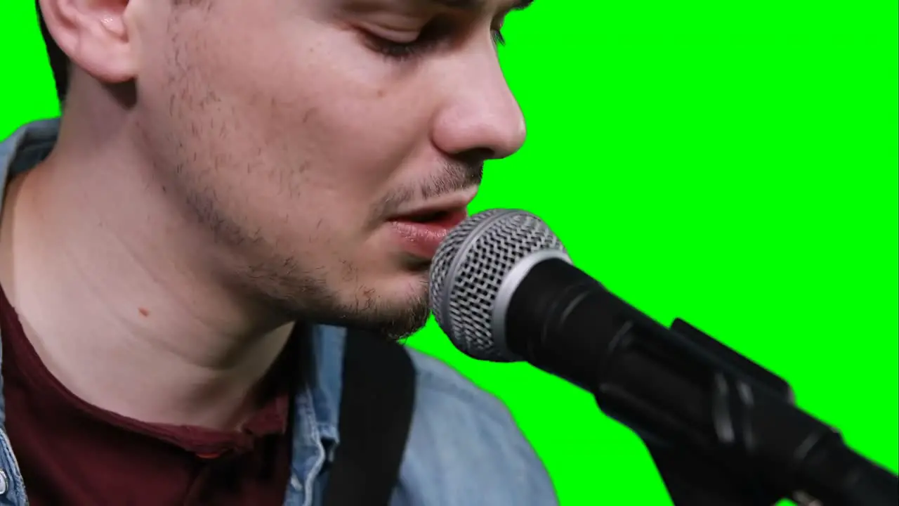 Close-up of singer singing songs on microphone