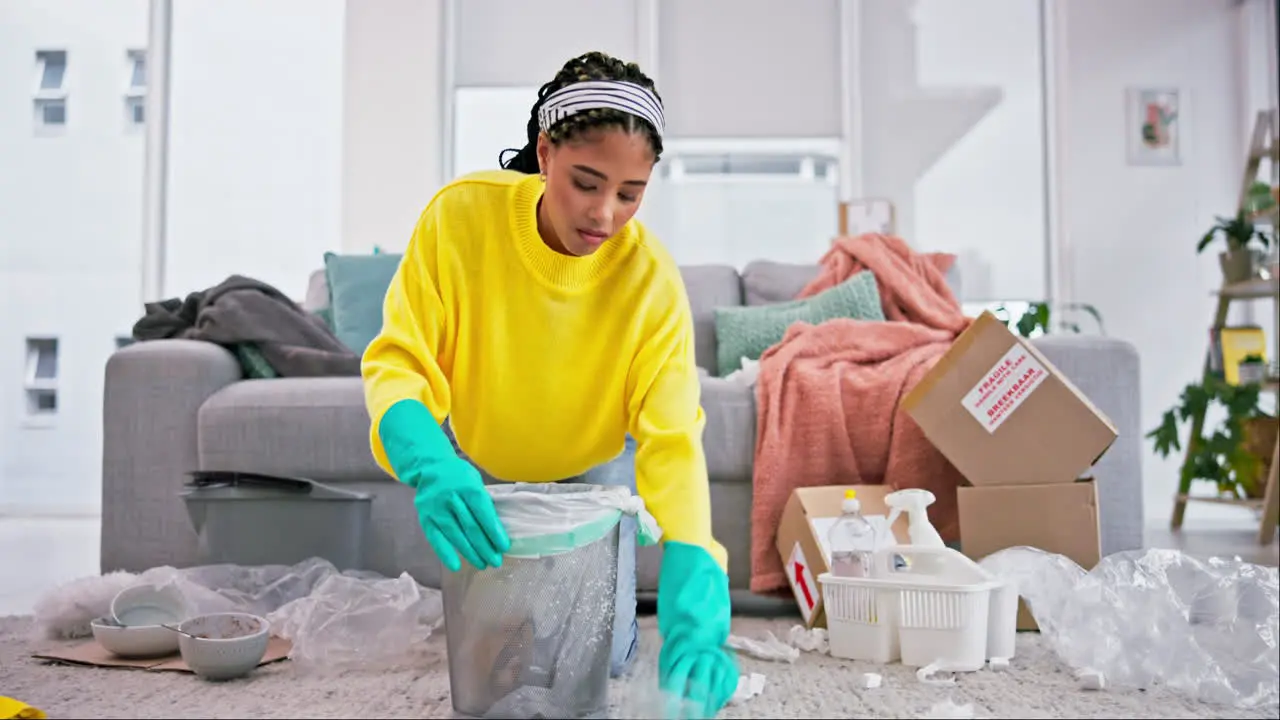 Cleaning garbage and woman in living room