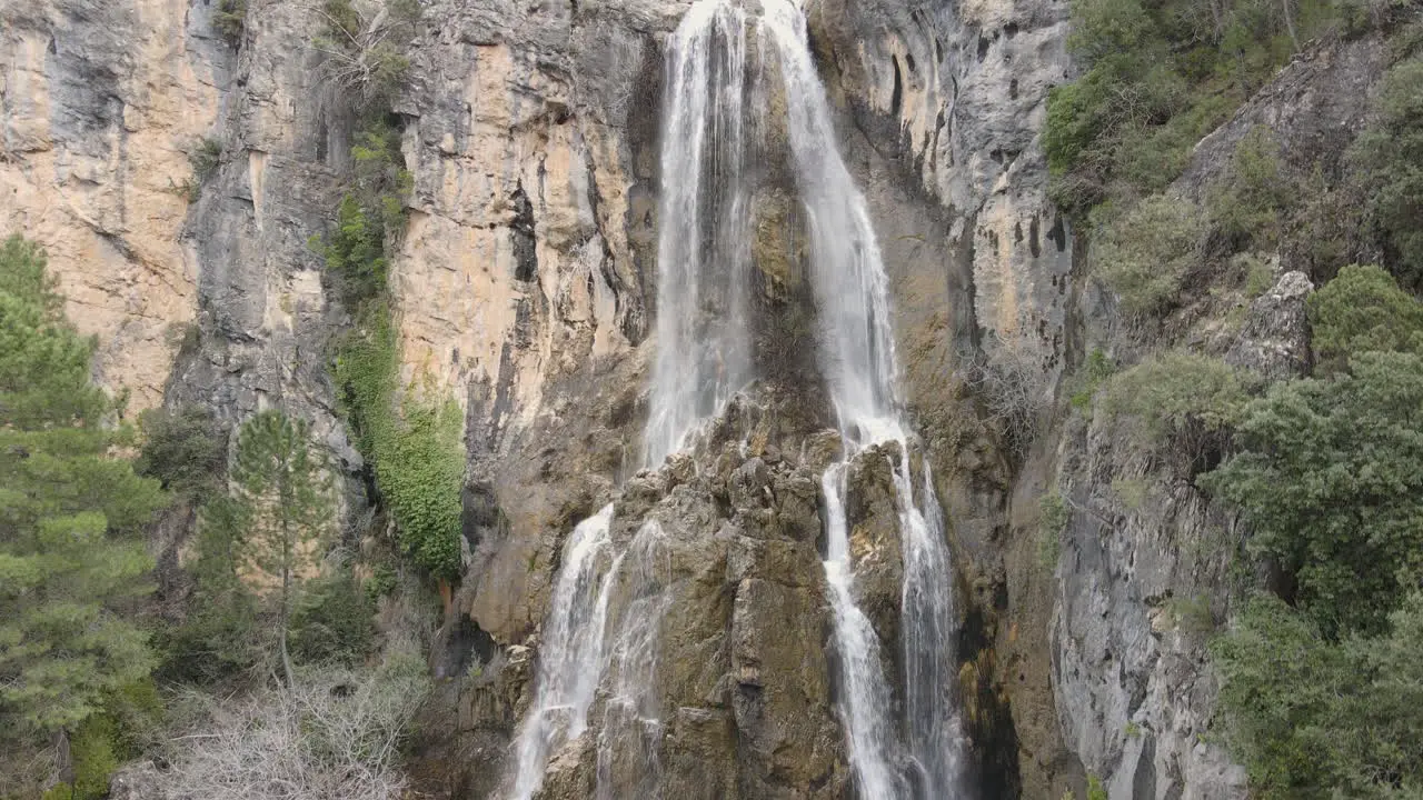 Aerial View Of Waterfall In The Middle Of The Gorge