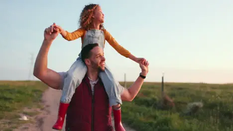 Happy father and child on shoulders