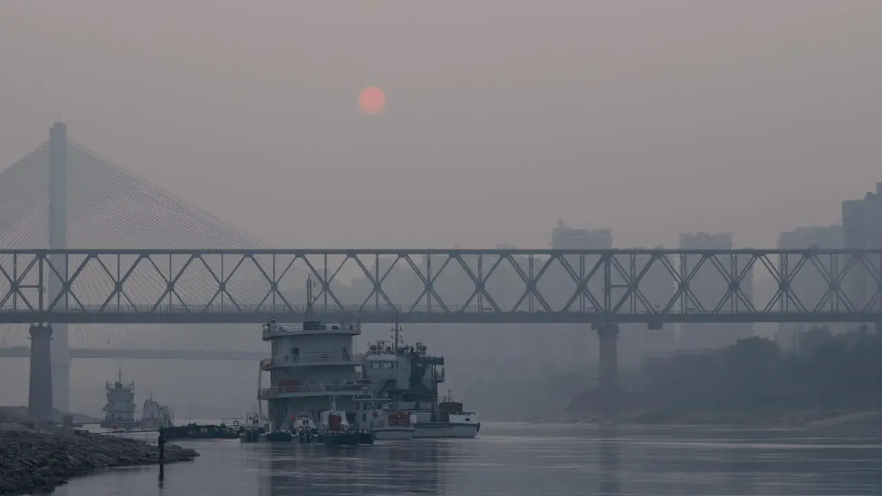 Sunset timelapse of a traditioanl Chinese river city by the Yangtze river