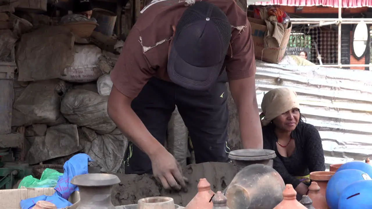 Kathmandu Nepal November 16 2019 A man making a clay pot on a potter's wheel