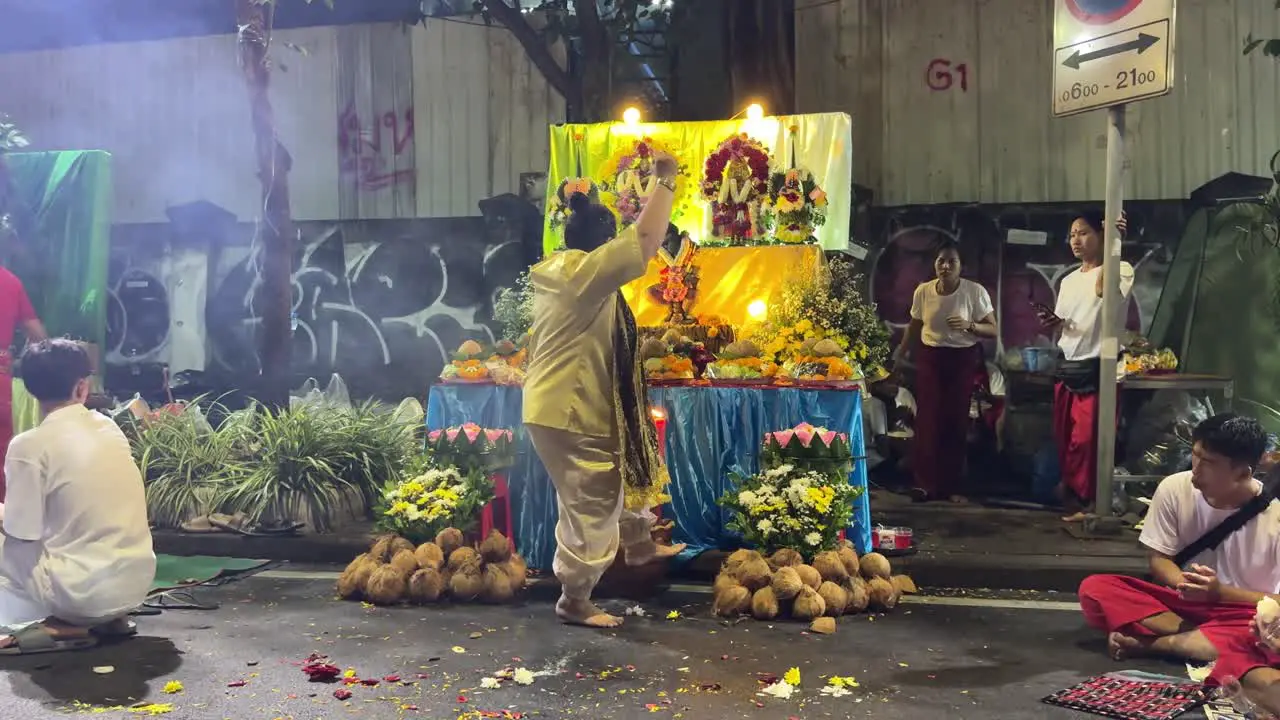 Devotees pray and perform a dance ritual during the Navaratri Festival in Bangkok Thailand