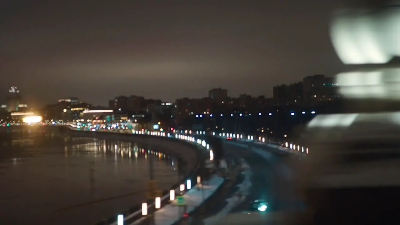 Traveling across Moscow by train at winter night