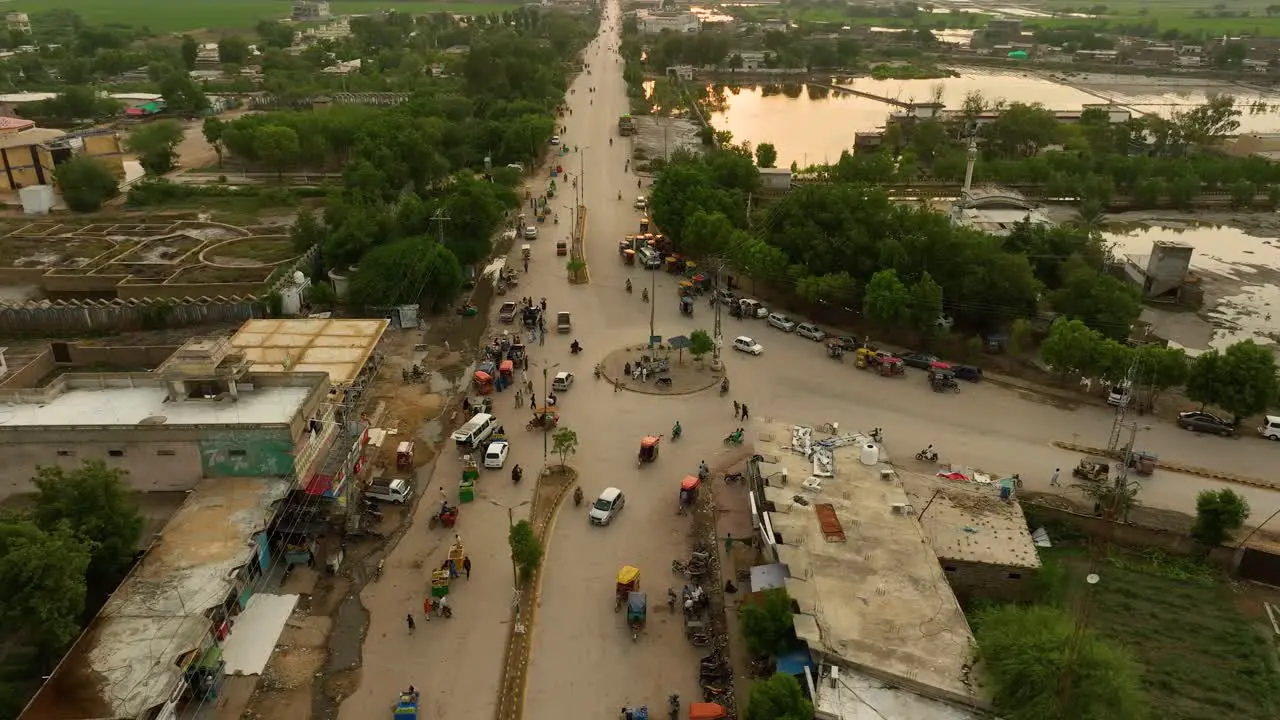 Aerial View Over Traffic Going Around Roundabout In Badin