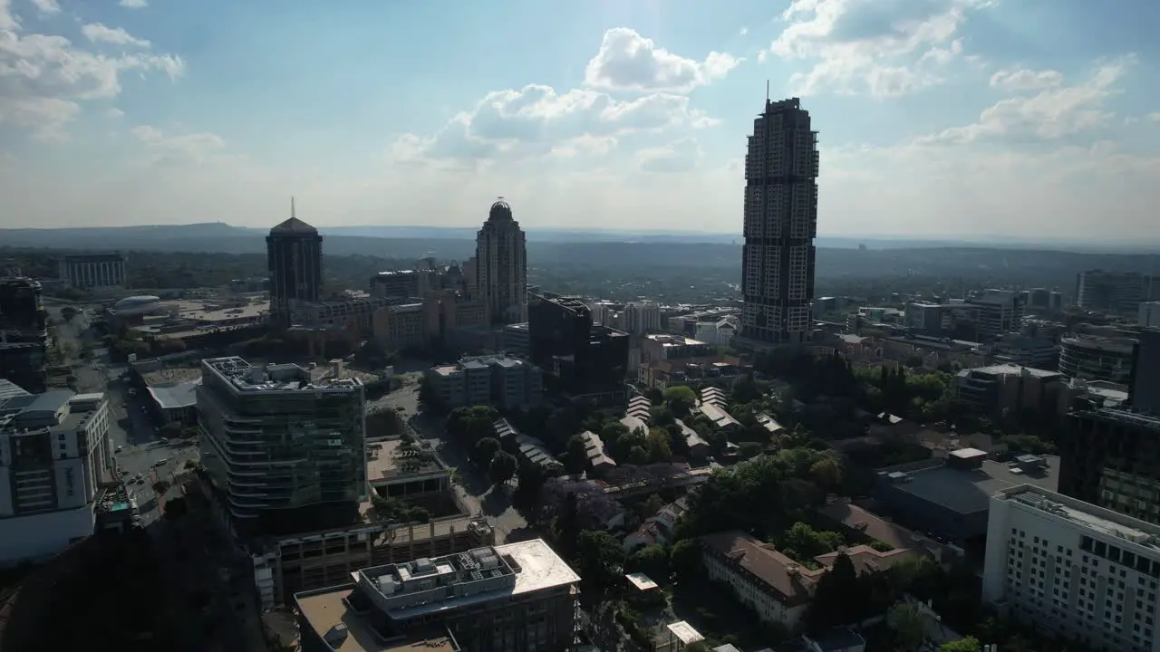 silhouette of city skyline on sunny day in Sandton Johannesburg South Africa aerial