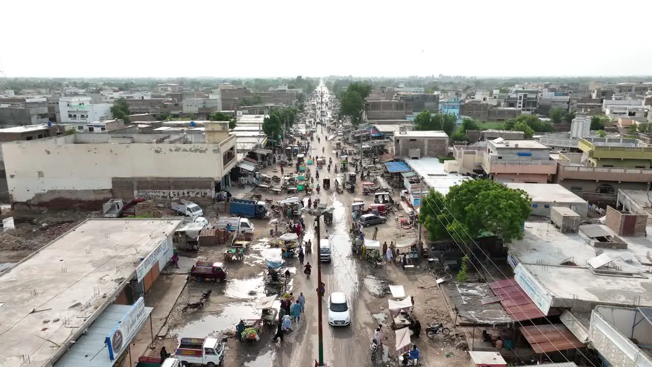 Aerial Flying Over Busy Road With Traffic In Badin Pakistan