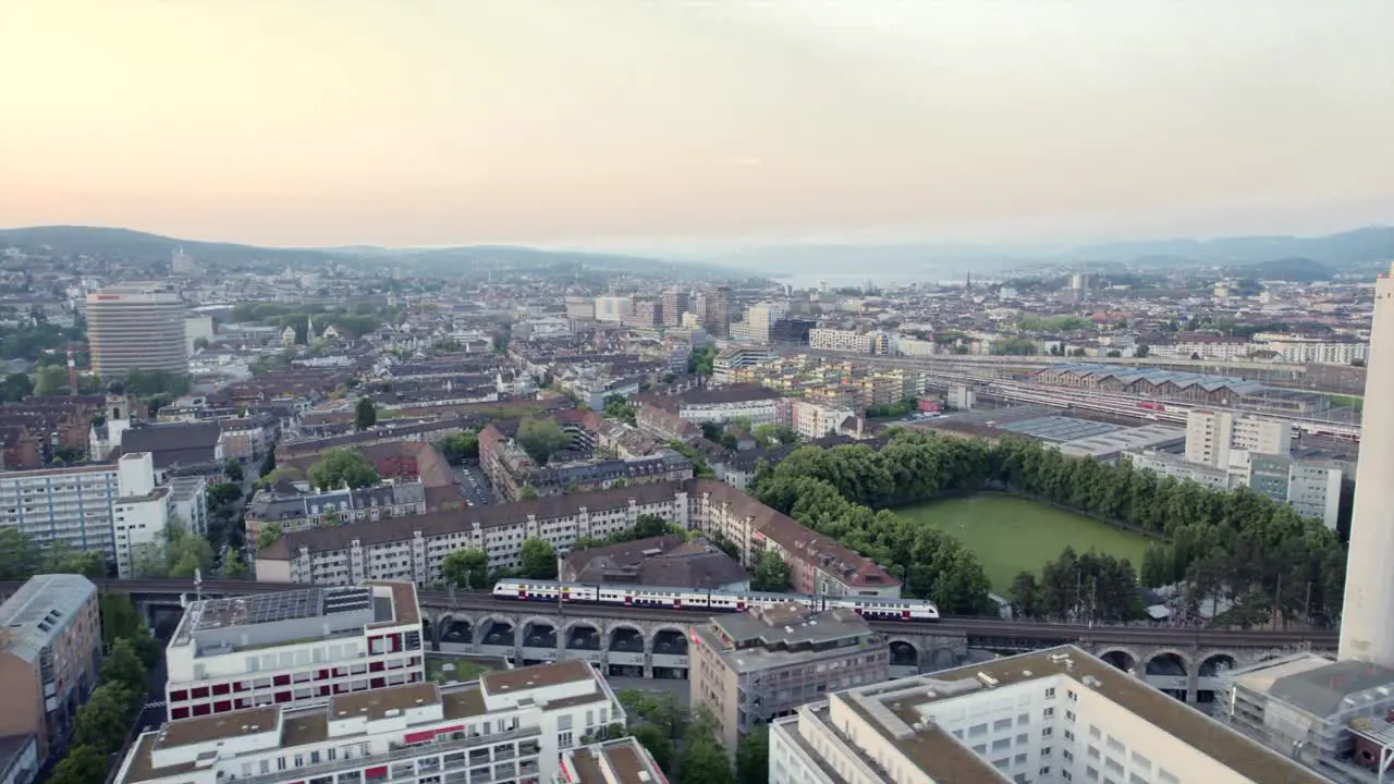 Aerial footage of a train in Zurich the capital and the largest city in Switzerland