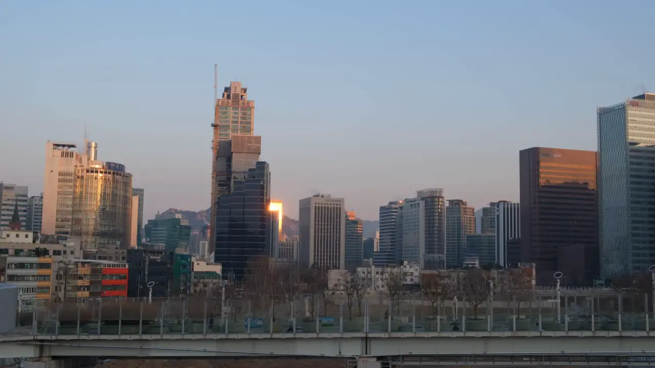 Beautiful sunrise in Seoul city with new glass skyscrapers on skyline