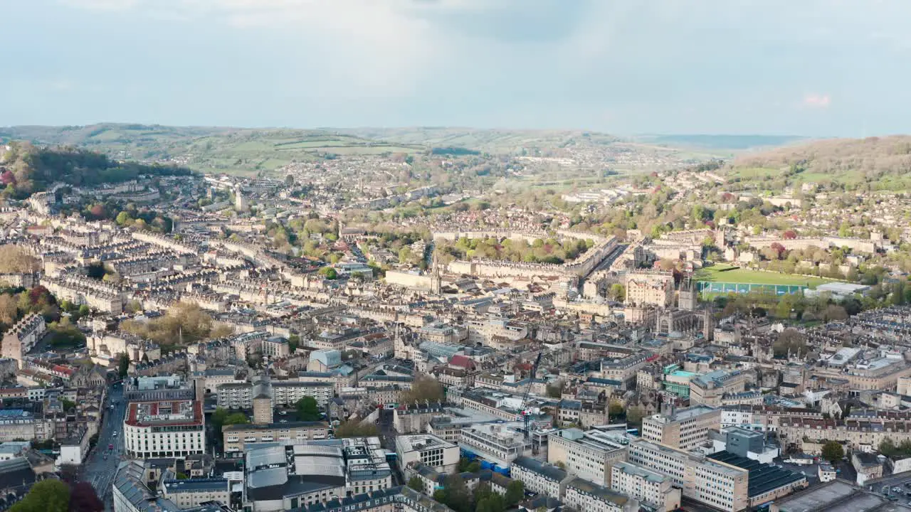 Rising drone shot over old buildings in Bath UK