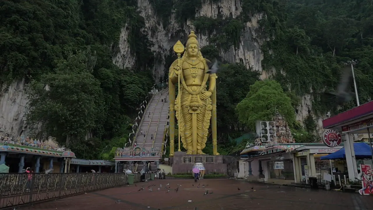 Slow motion of statue of Murugan at Batu Caves Malaysia