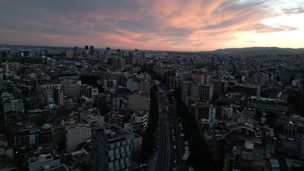 Sunset Cloudy Drone Shot Over Cityscape in Barcelona Spain