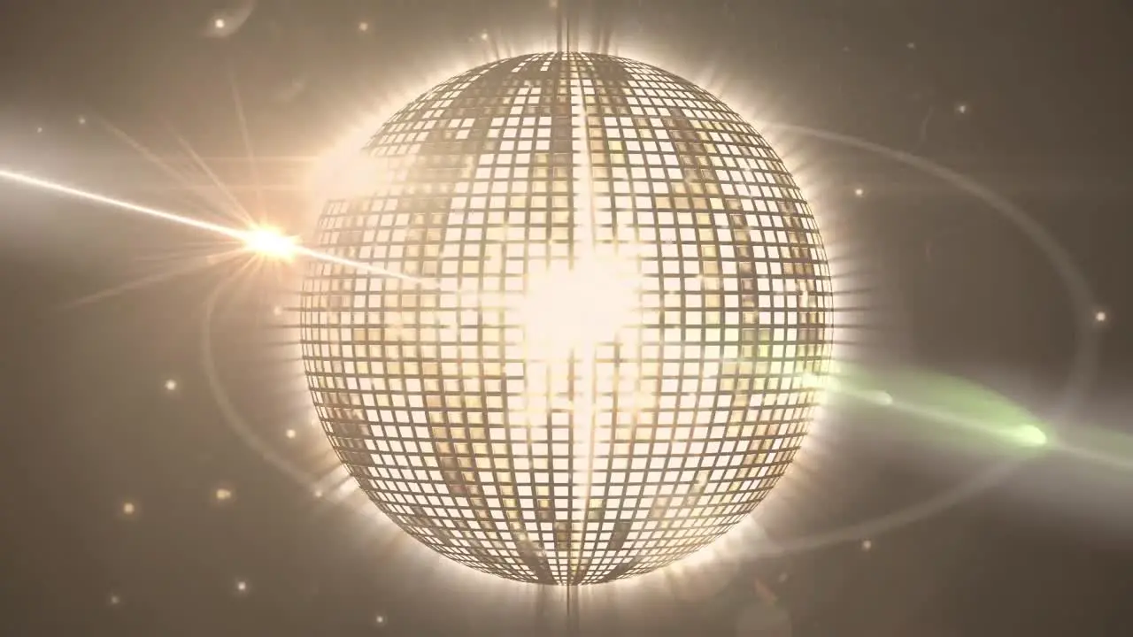 Animation of glowing disco ball over dark background