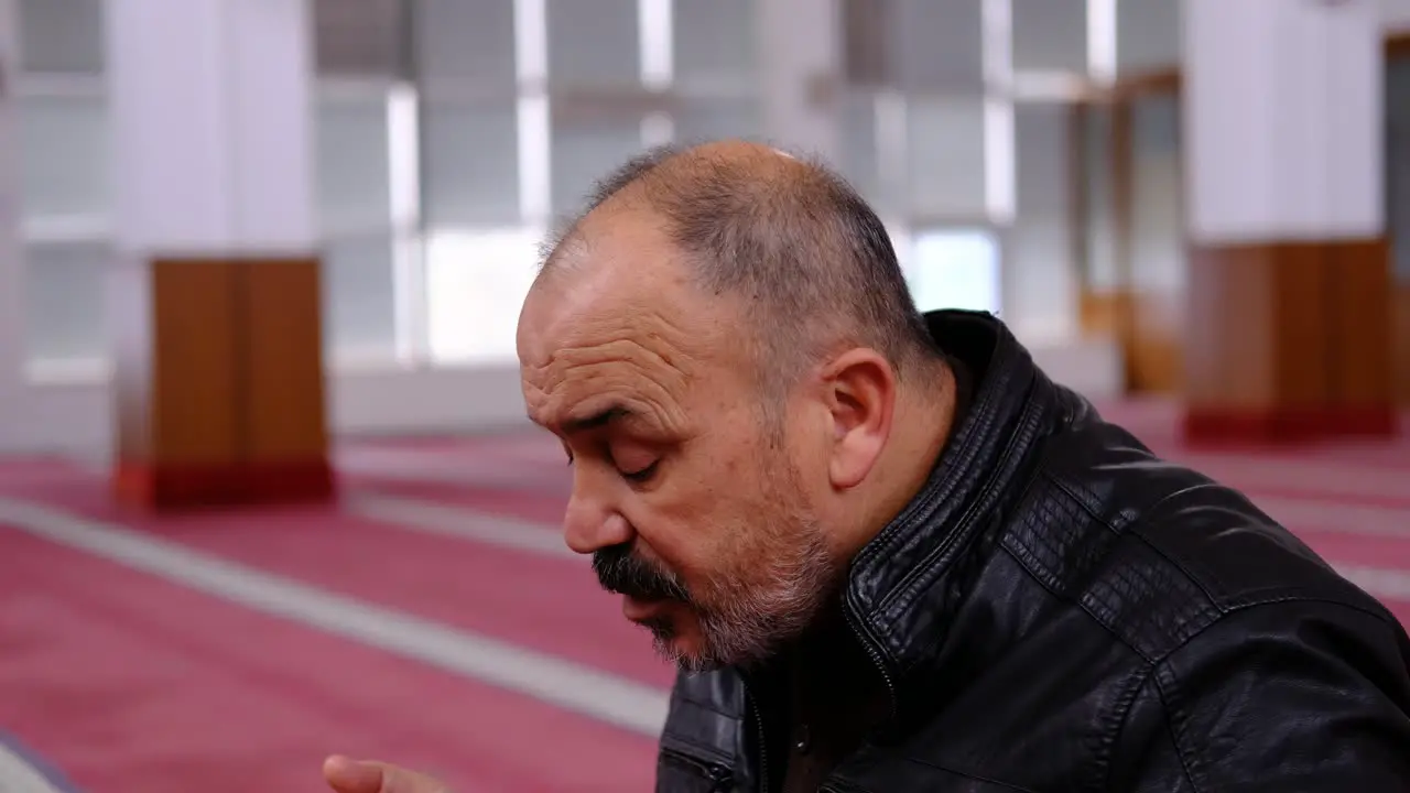 Old Man Raising His Hands And Praying In The Mosque 2