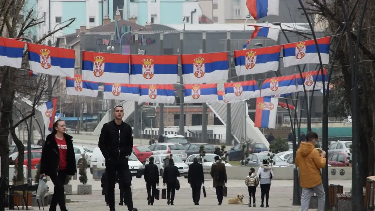 Streetview northern Mitrovica Kosovo with many Serbian flags