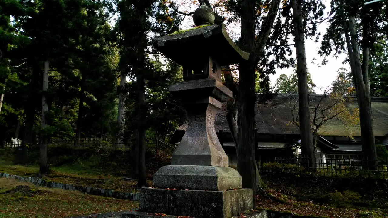 A stone lantern at a japanese shrine