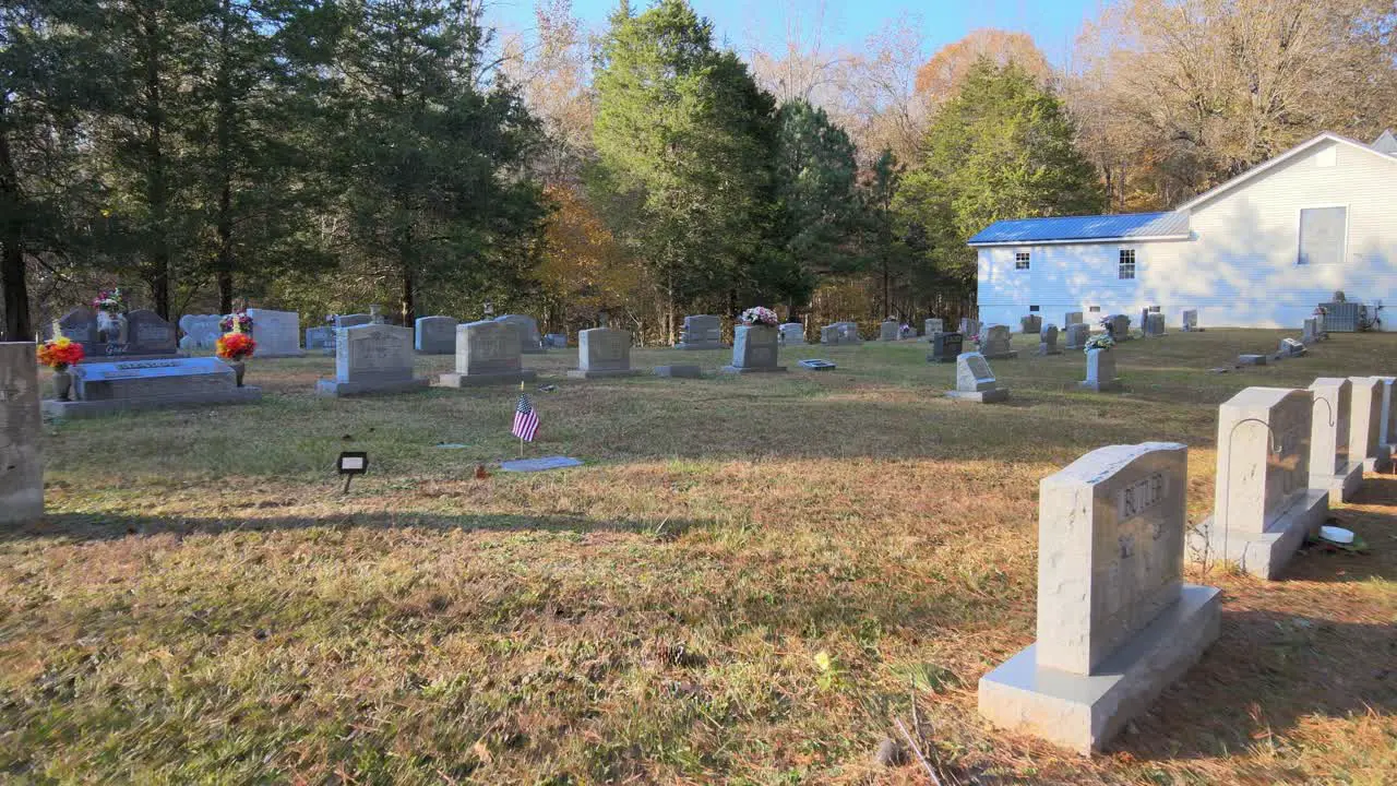 Flying over tombstones in a cemetary