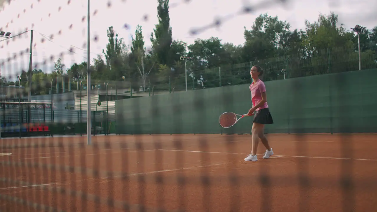 Female tennis player hitting the ball