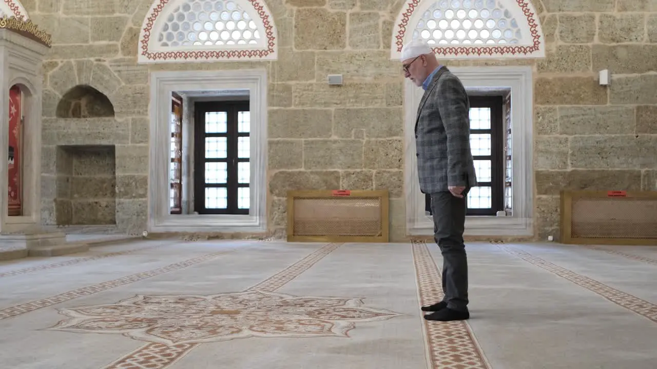 Muslim praying in mosque