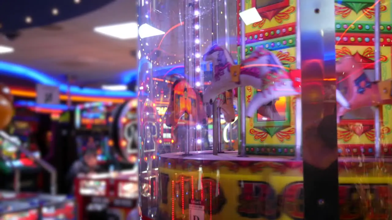 Amusement arcade carousel with slot machines