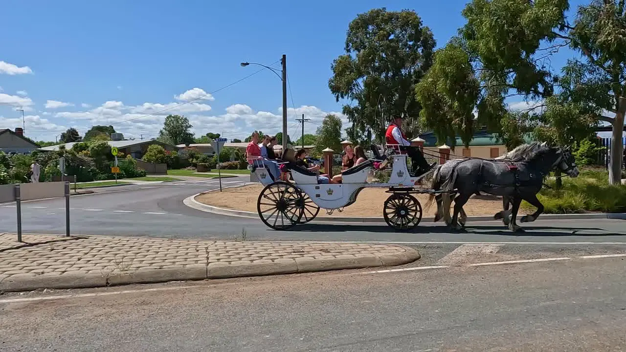 Yarrawonga Victoria Australia 7 October 2023 Horse drawn carriage with passengers outside the Yarrawonga Show in Victoria Australia