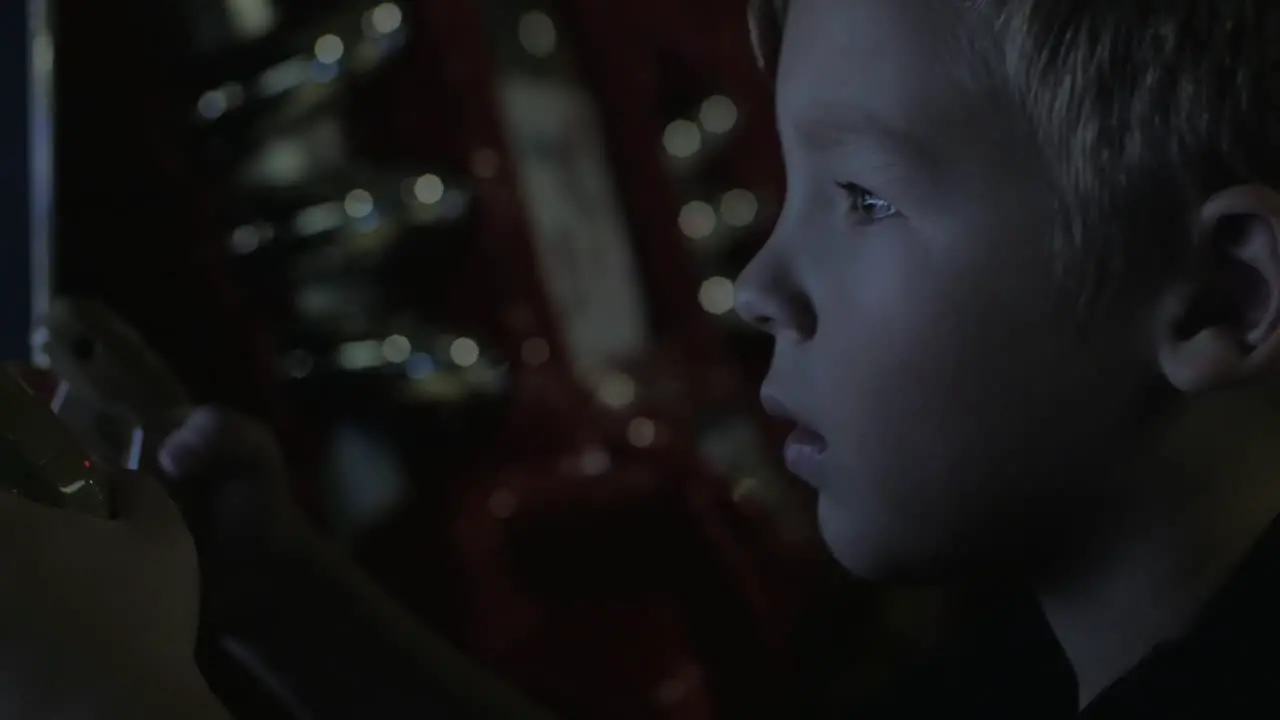 Child shooting on amusement machine