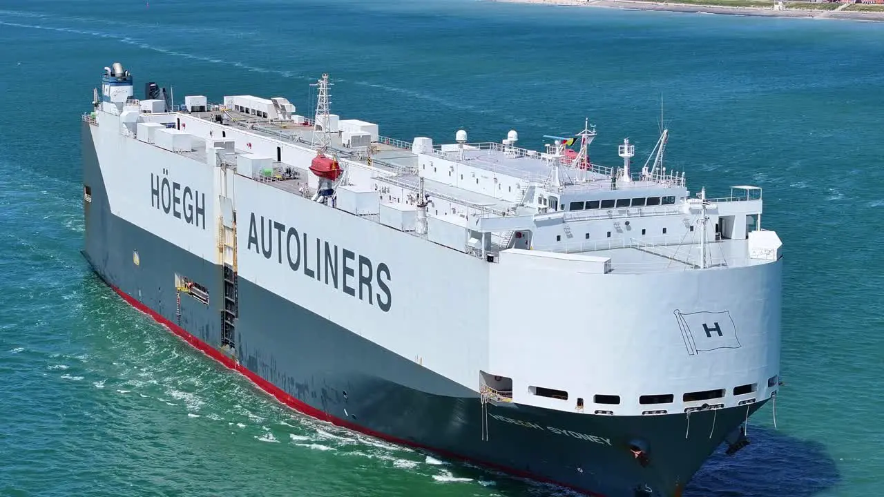 Large car carrier Hoegh Sydney sailing over the blue North Sea