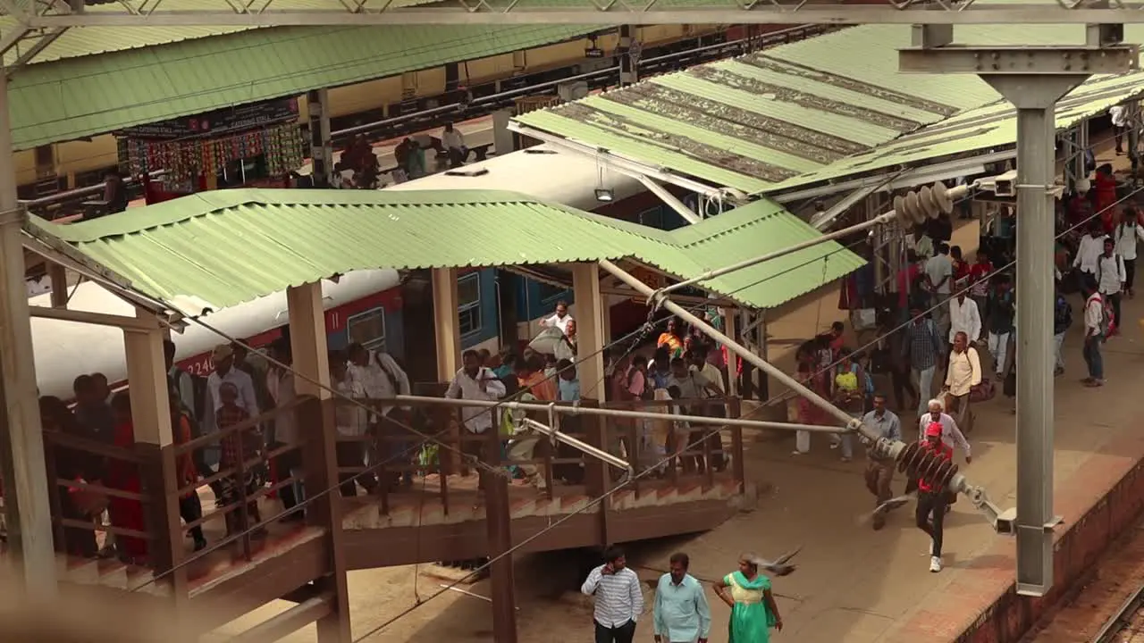 People busy in moving on the staircase at urban Bengaluru city railway station Karnataka