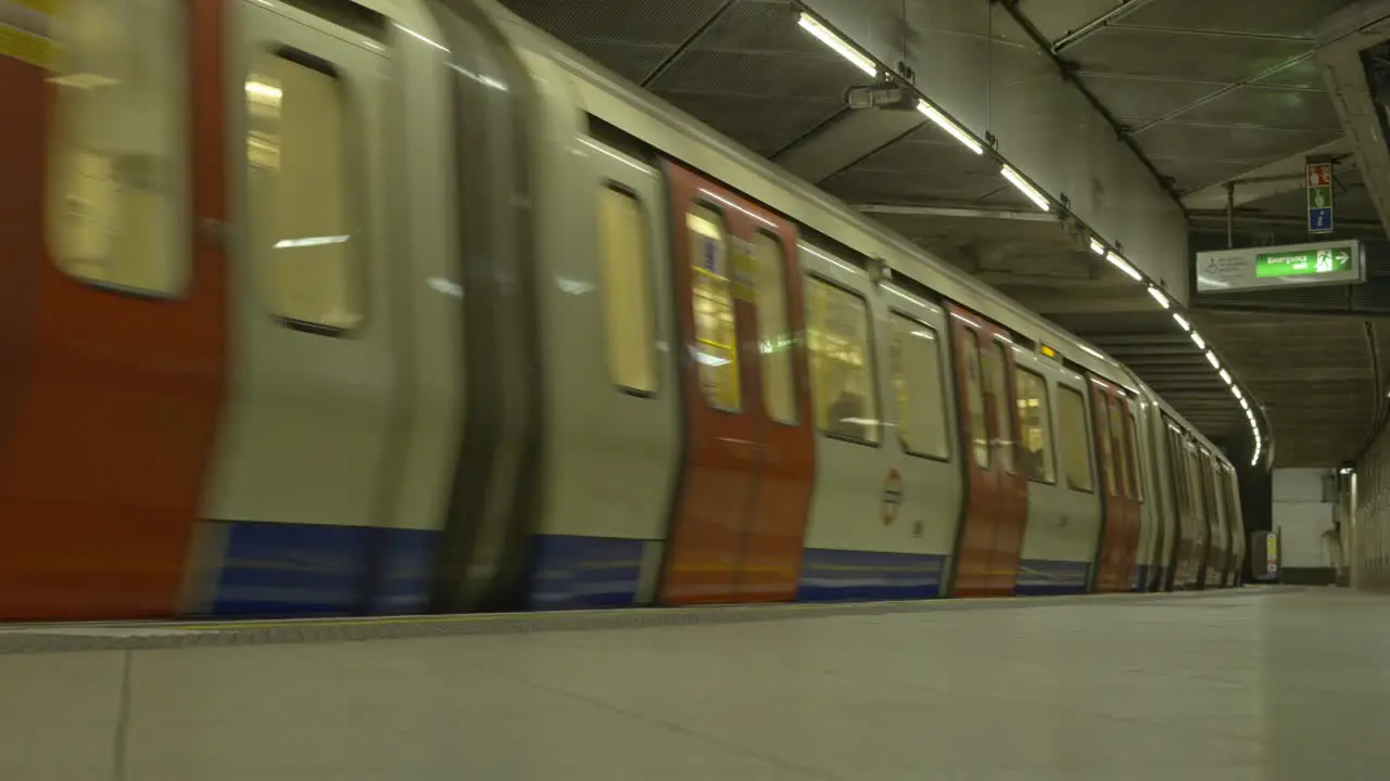 Underground train arriving at London metro station UK