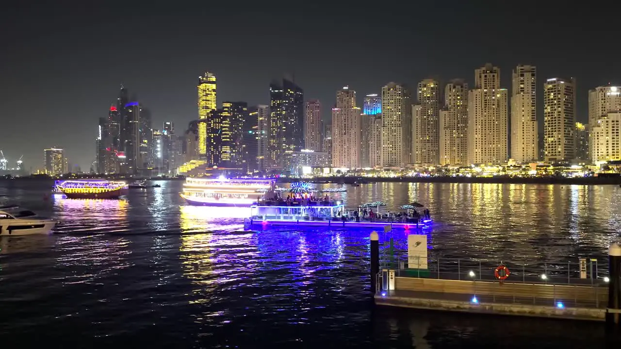 Night view of Blue waters island new walking area with shopping mall and restaurants Dubai UAE 25