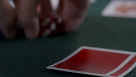 Extreme Close Up Shot of Poker Player Looking at Seven Deuce Before Bluffing