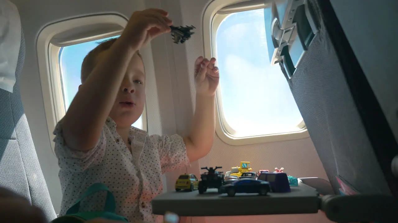 Child playing with toys during the flight