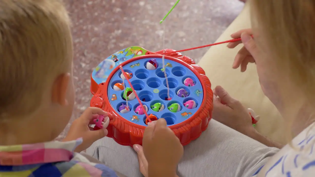 Family having fun with fishing game